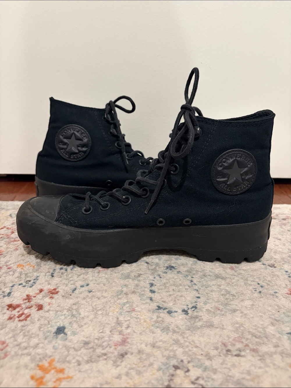 Converse CTAS Lugged Hi Tops Black platform sneakers